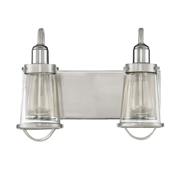 The Lansing bath bar delivers authentic industrial style with its cage-like shades and mixed metal finishes. Perfect for modern farmhouse or transitional spaces, it provides ample task lighting while adding vintage character above any vanity. - alternate view