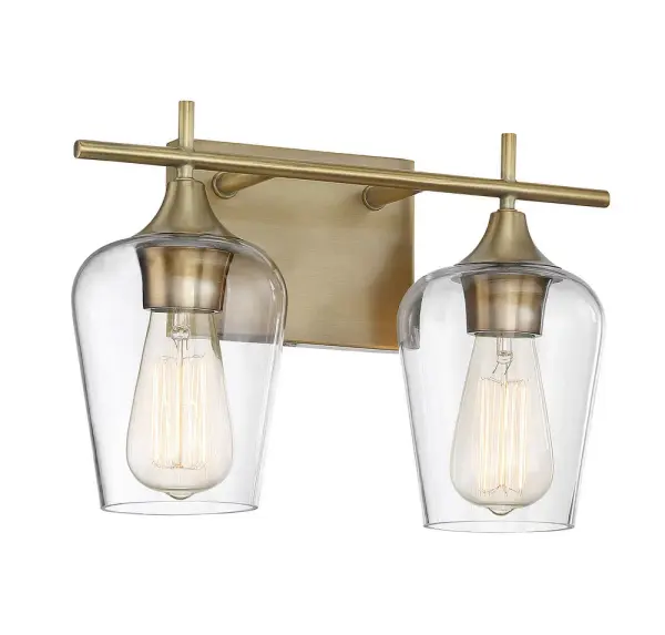 The Octave bath bar combines understated elegance with practical versatility. Its curved clear glass shades and warm brass finish create a sophisticated look that works beautifully in both traditional and contemporary bathrooms. - alternate view