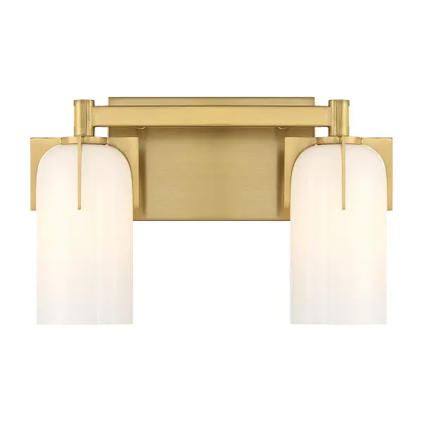 The Caldwell bath bar combines vintage charm with modern functionality. Its dramatic prong design and warm brass finish add sophistication to any bathroom, while etched opal glass provides soft, flattering illumination.
