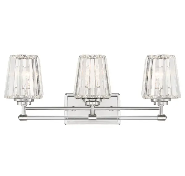 The Garnet vanity light brings sophisticated sparkle to bathroom spaces with faceted clear crystal slats and crystal tube detailing. The polished nickel finish adds a refined touch while the 24-inch width provides ample illumination for medium to large vanities.