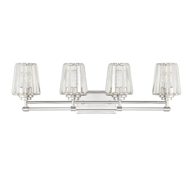 The Garnet vanity light elevates bathroom design with faceted clear crystal slats and crystal tube detailing on the arms. The polished nickel finish adds a sophisticated touch while the 32-inch width provides ample illumination for larger vanities. - alternate view