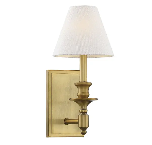 The Washburn sconce delivers timeless sophistication with its clean lines, warm brass finish, and white linen shade. Perfect for traditional and transitional spaces, it provides flattering ambient light ideal for flanking mirrors or illuminating hallways.