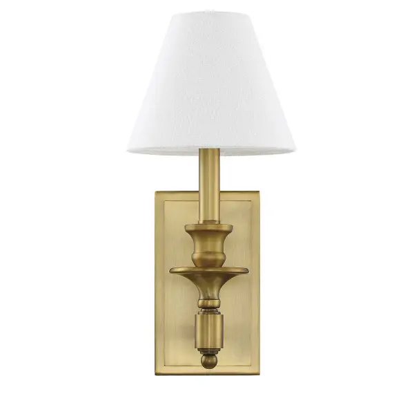 The Washburn sconce delivers timeless sophistication with its clean lines, warm brass finish, and white linen shade. Perfect for traditional and transitional spaces, it provides flattering ambient light ideal for flanking mirrors or illuminating hallways. - alternate view
