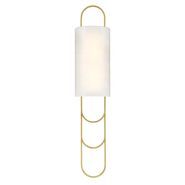 The Tartine LED sconce combines sleek vertical design with jewelry-like detailing. Its stunning strie glass shade creates visual interest while the warm brass finish adds timeless elegance to any space.