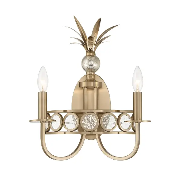 The Hearst sconce combines timeless elegance with distinctive details. Antique glass discs create visual texture while decorative leaf crowns add warmth. The Noble Brass finish brings richness to any space.