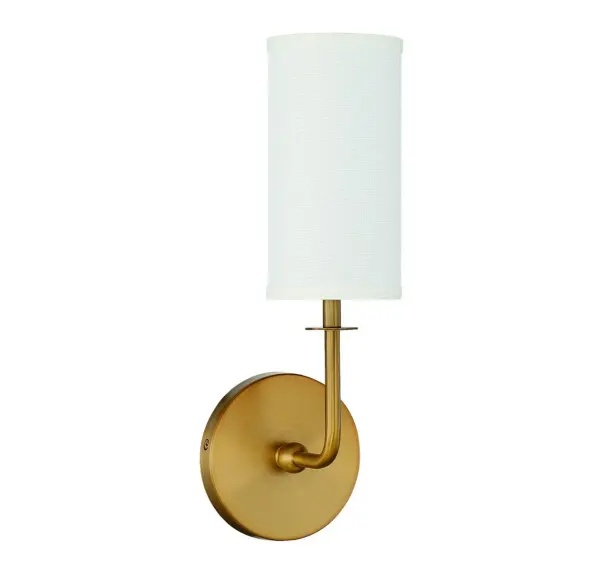 The Powell wall sconce delivers understated elegance with its curved arm design and warm brass finish paired with a white fabric cylindrical shade. Perfect for accent lighting in bathrooms, bedrooms, and hallways. - alternate view