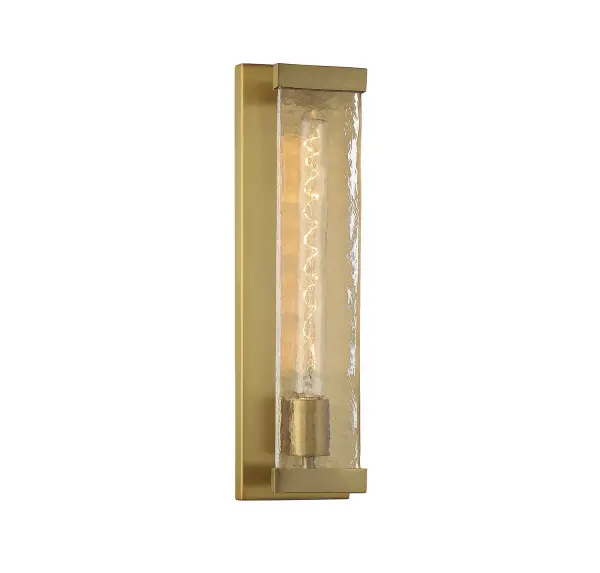 The Alberta wall sconce blends nostalgic charm with industrial edge through its wavering Piastra glass and warm brass finish. Compact at 17.5" tall, it's ideal for hallways, bathrooms, and entryways where vertical space is limited.