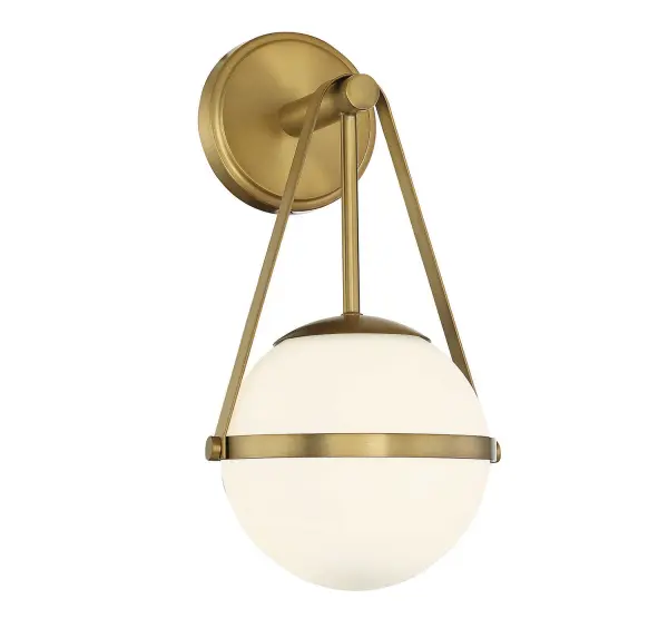The Polson wall sconce brings sophisticated midcentury style with its opal glass orb held by a slender rod and decorative metal strap. The warm brass finish adds timeless elegance to any space.