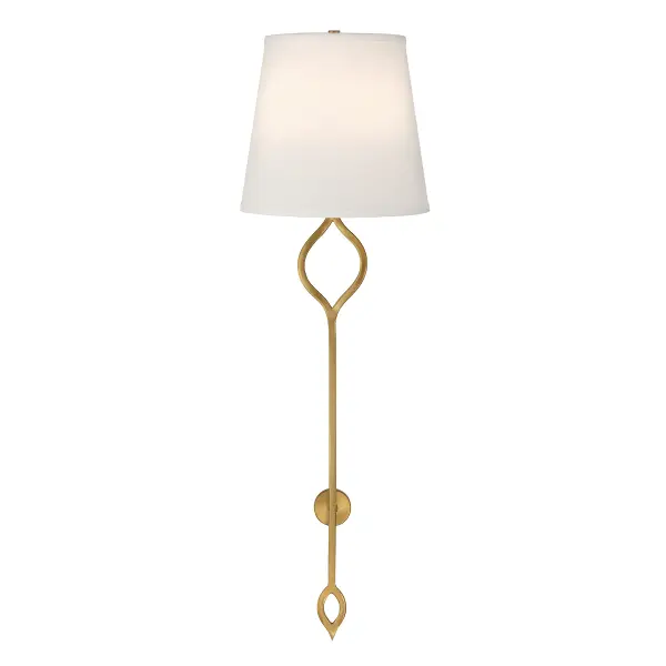 The Roxbury sconce brings stately elegance with its 31.5-inch height and warm brass finish. The white fabric shade softens the light while thoughtful arm detailing adds visual interest. Damp-rated for versatile placement.
