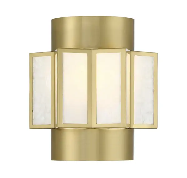 The Gideon sconce combines natural capiz shell with a warm brass frame in a boldly geometric design. The shell creates mesmerizing patterns when off and a soft, diffused glow when lit, making it ideal for intimate spaces.