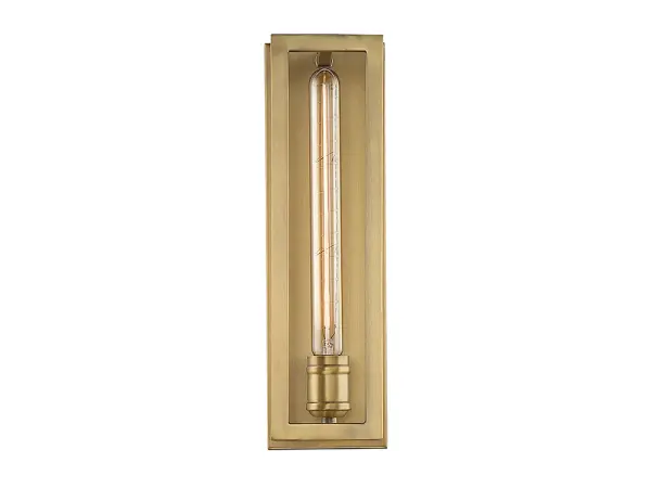 The Clifton sconce showcases an exposed bulb within a slim, tall metal frame finished in warm brass. Its minimalist design adds contemporary sophistication to hallways, bathrooms, and entryways while providing functional lighting.