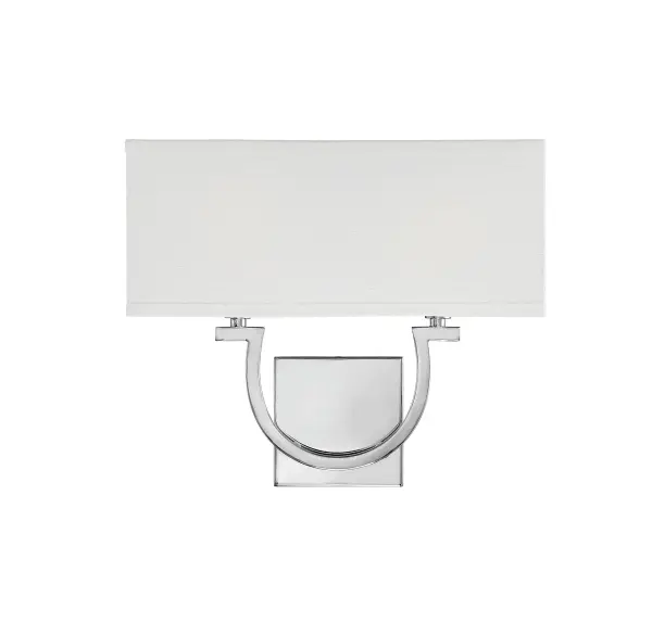The Rhodes wall sconce combines traditional charm with contemporary polish, featuring an elongated horseshoe silhouette that works beautifully in bathrooms, bedrooms, and hallways. The neutral white linen shade and polished nickel finish create a refined look that complements both classic and modern interiors.