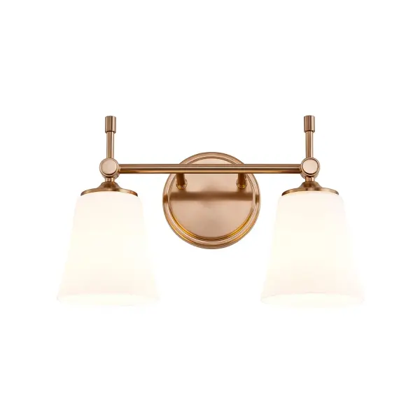 Transitional two-light bath vanity wall sconce with clean, balanced proportions that bridge classic and modern design, Can be mounted upward or downward to suit different lighting needs and design preferences, Brushed brass finish delivers a refined, versatile look that pairs effortlessly with today's bathroom fittings and hardware, Round backplate with subtle stepped detailing adds depth and a tailored architectural touch, Horizontal arm features a sleek cylindrical profile, creating a strong visual line across the fixture, Small pivot-style joints beneath each shade add refined detailing and enhance the fixture's crafted appearance, Short vertical decorative stem drops below the each joint, adding visual balance and a touch of understated tradition, Opal artisan glass shades feature a gently flared form, wider at the top and tapering toward the metal fitter, Soft opal artisan glass diffuses light evenly, producing a warm, glare-free illumination ideal for everyday use, Uses two standard E26 base sockets for easy lamping flexibility (bulbs are not included), Ideal for bathroom vanities, powder rooms, dressing areas, or hallways where balanced ambient light is desired, Complements a wide range of interiors including transitional, contemporary, and updated classic spaces, Suitable for residential, commercial, or hospitality environments seeking timeless style with practical functionality Collection: Fusion Finish: Brushed Brass Glass: Opal Glass Width: 15.00" Height: 9.25" Extension from Wall: 6.25" Canopy: 5.25" Dia x 0.75" Proj. Number of Bulbs: 2 Maximum Wattage: 100.00 W Bulb Base: E26 Voltage: 120.00 V Safety Rating: Damp