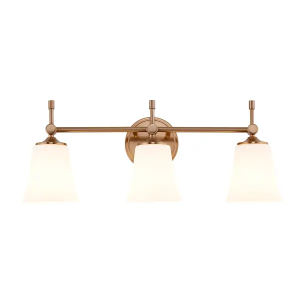 Three light bath vanity sconce with a balanced, linear composition that provides ample, even illumination across larger vanities, Convertible installation allows the fixture to be mounted upward or downward, offering flexibility for both ambient and task lighting preferences, Round backplate with subtle stepped detailing adds a refined architectural touch while maintaining a clean, tailored profile, Slim horizontal arm features a smooth cylindrical form that creates a sense of lightness and visual continuity across the design, Each light is supported by a pivot-style joint, adding a subtle decorative detail while enhancing the fixture's crafted appearance, Short vertical decorative stems drop beneath each joint, introducing visual weight and a classic accent that grounds the overall design, Opal artisan glass shades feature a gently flared silhouette, wider at the top and tapering toward the metal fitter for a soft, elegant profile, Opal artisan glass diffuses light evenly to produce a warm, comfortable glow without harsh glare, ideal for daily grooming and ambient lighting, Brushed brass finish delivers a timeless, versatile look that pairs effortlessly with contemporary, transitional, and updated classic interiors, Uses standard E26 base bulbs for easy replacement and compatibility with a wide range of incandescent or LED options (bulbs not included), Thoughtfully proportioned design complements today's furnishings while maintaining enduring appeal beyond short-lived trends, Ideal for bathrooms, powder rooms, dressing areas, and hospitality guest baths where both function and refined style are essential, Equally suited for residential, commercial, and hospitality applications, offering a polished, cohesive lighting solution across multiple environments Collection: Fusion Finish: Brushed Brass Glass: Opal Glass Width: 23.50" Height: 9.25" Extension from Wall: 6.25" Canopy: 5.25" Dia x 0.75" Proj. Number of Bulbs: 3 Maximum Wattage: 100.00 W Bulb Base: E26 Voltage: 120.00 V Safety Rating: Damp