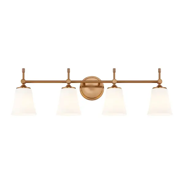Four light bath vanity sconce with a balanced, linear composition that provides ample, even illumination across larger vanities, Convertible installation allows the fixture to be mounted upward or downward, offering flexibility for both ambient and task lighting preferences, Round backplate with subtle stepped detailing adds a refined architectural touch while maintaining a clean, tailored profile, Slim horizontal arm features a smooth cylindrical form that creates a sense of lightness and visual continuity across the design, Each light is supported by a pivot-style joint, adding a subtle decorative detail while enhancing the fixture's crafted appearance, Short vertical decorative stems drop beneath each joint, introducing visual weight and a classic accent that grounds the overall design, Opal artisan glass shades feature a gently flared silhouette, wider at the top and tapering toward the metal fitter for a soft, elegant profile, Opal artisan glass diffuses light evenly to produce a warm, comfortable glow without harsh glare, ideal for daily grooming and ambient lighting, Brushed brass finish delivers a timeless, versatile look that pairs effortlessly with contemporary, transitional, and updated classic interiors, Uses standard E26 base bulbs for easy replacement and compatibility with a wide range of incandescent or LED options (bulbs not included), Thoughtfully proportioned design complements today's furnishings while maintaining enduring appeal beyond short-lived trends, Ideal for bathrooms, powder rooms, dressing areas, and hospitality guest baths where both function and refined style are essential, Equally suited for residential, commercial, and hospitality applications, offering a polished, cohesive lighting solution across multiple environments Collection: Fusion Finish: Brushed Brass Glass: Opal Glass Width: 32.50" Height: 9.25" Extension from Wall: 6.25" Canopy: 5.25" Dia x 0.75" Proj. Number of Bulbs: 4 Maximum Wattage: 100.00 W Bulb Base: E26 Voltage: 120.00 V Safety Rating: Damp