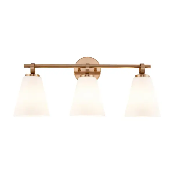 Contemporary 3-light bath vanity sconce from the Bolzano Family featuring a clean, architectural silhouette, can be mounted upward or downward to suit different lighting needs and design preferences, brushed brass finish provides a soft, refined tone with understated luxury that complements modern, transitional or contemporary interiors, gently tapered opal artisan glass shades diffuse light evenly, creating a warm, calming glow without glare or visible hotspots, when mounted downward, each shade creates the visual impression of being suspended from the thick, flat decorative ring by the horizontal bar, forming a jewelry-like accent that adds depth, craftsmanship, and visual interest without overpowering the design, horizontal bar design offers strong visual balance and makes the fixture ideal for placement above bathroom vanities and mirrors, round backplate anchors the design cleanly against the wall while maintaining a streamlined appearance, thoughtful proportions ensure the fixture feels substantial yet refined, making it suitable for use as a focal point or in repeated installations, pairs beautifully with contemporary, modern, and updated transitional furnishings, ideal for residential bathrooms, powder rooms, dressing areas, and hospitality applications, opal glass enhances both upward and downward mounting by delivering soft ambient illumination, uses (3) medium base E26 bulbs (not included), capable of being dimmed when used with compatible bulbs and dimmer switches, ETL listed for damp locations and designed with lasting style and quality in mind. Collection: Fusion Finish: Brushed Brass Glass: Opal Glass Width: 24.00" Height: 10.75" Extension from Wall: 6.50" Canopy: 4.75" Dia x 0.75" Proj. Number of Bulbs: 3 Maximum Wattage: 100.00 W Bulb Base: E26 Voltage: 120.00 V Safety Rating: Damp