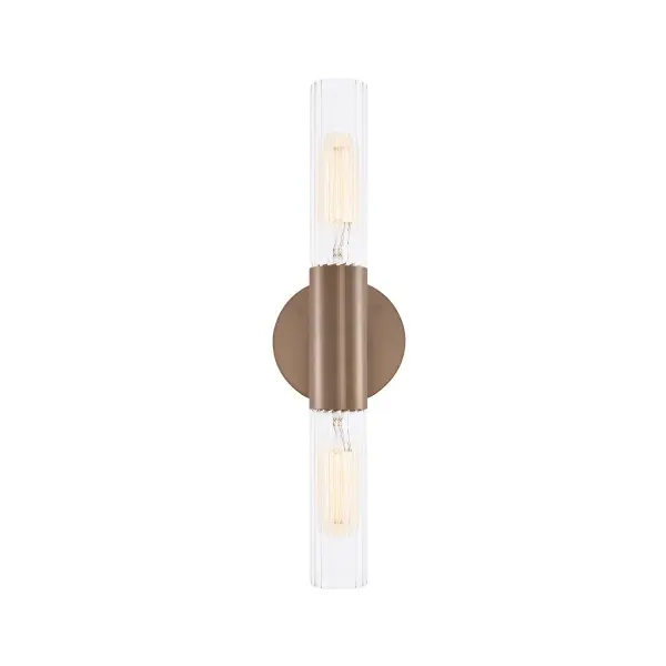 Sleek, architectural silhouette, Clear glass shades smooth on the exterior with fluted detailing on the interior, Dual cylindrical glass design delivers illumination both upward and downward, Warm Brushed Brass finish paired with crisp clear fluted glass, Semi-exposed light sources visible through the fluted glass for added decorative impact, Refined metal center column creates a clean, balanced vertical composition, Clean round backplate design, Glass shades install easily by hand with a simple screw-on / screw-off design, ADA compliant with less than 4" projection from the wall to the outer edge of the glass, Allows use in corridors and high-traffic areas without compromising accessibility, Ideal for hospitality, multifamily, and commercial spaces requiring ADA compliance, Can be installed vertically or horizontally for added design flexibility, Up-and-down light distribution enhances wall texture and architectural detail, Creates visual interest both when illuminated and when off, Provides layered ambient lighting without visual clutter, Modern design with subtle mid-century influence, Ideal for hallways, stairways, bedrooms, bathrooms, and living spaces, Perfect for mirrors, artwork, or architectural features, Suitable for residential and hospitality environments, Versatile style suited for transitional through contemporary interiors, Collection: Fusion Finish: Brushed Brass Glass: Clear Ribbed Glass Width: 4.25" Height: 16.75" Extension from Wall: 3.25" Canopy: 4.25" Dia x 0.75" Proj. Number of Bulbs: 2 Maximum Wattage: 60.00 W Bulb Base: E26 Voltage: 120.00 V Safety Rating: Damp ADA
