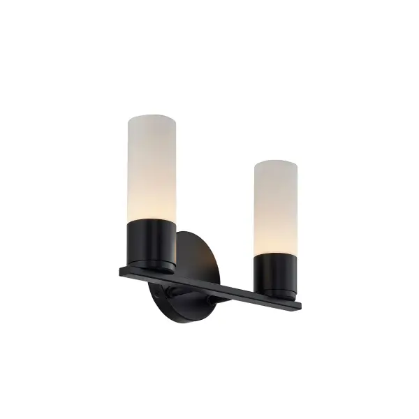 Sleek, architectural two-light bath vanity sconce with a clean, modern presence, Features two slim cylindrical opal glass shades that create a refined vertical emphasis, Opal glass is smooth on the exterior with subtle fluted detailing on the interior, visible once illuminated for added depth and texture, Matte black metal finish provides strong contrast against the luminous glass, reinforcing a contemporary, architectural aesthetic, Straight horizontal metal bar and compact cylindrical holders create a clean, tailored composition, Round backplate anchors the design and keeps the overall form balanced and intentional, Can be mounted upward or downward for design flexibility, Downward orientation delivers focused, functional illumination ideal for vanity and task applications, Upward orientation provides a softer, ambient wash of light that feels architectural and atmospheric, Even, diffused illumination with no visible bulbs or harsh glare, Balanced proportions make the fixture ideal for standard and wider vanities, mirrors, or wall applications, Modern silhouette with subtle mid-century influence that avoids trend fatigue, Provides decorative ambient lighting without visual clutter, Glass shades install easily by hand with a simple screw-on / screw-off design, Suitable for residential, hospitality, and commercial environments, ADA compliant with less than 4 inches of projection from the wall Rated for damp locations, Capable of being dimmed, Requires (2) medium (E26) bulbs (not included), Timeless, versatile design that pairs seamlessly with contemporary, transitional, and architectural interiors. Collection: Fusion Finish: Matte Black Glass: Ribbed Glass Width: 13.00" Height: 9.00" Extension from Wall: 4.00" Canopy: 4.5" Dia x 1" Proj. Number of Bulbs: 2 Maximum Wattage: 4.50 W Light Source: LED Light Output: 810.00 lm Delivered Lumens: 530.00 lm Voltage: 120.00 V Safety Rating: Damp ADA LED