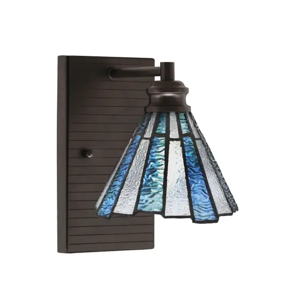 The Edge Wall Sconce combines contemporary styling with artisan glass craftsmanship. Its compact 7-inch profile and brushed nickel finish make it ideal for bathrooms, hallways, and powder rooms where space is limited but style matters.