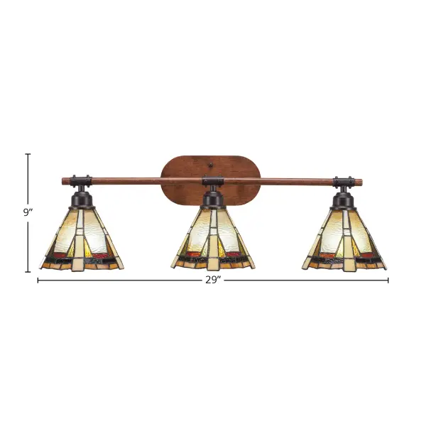 The Blacksmith 3-Light Bath Bar combines rustic charm with practical illumination. Featuring painted wood-look metal in a dark granite finish and stunning Zion art glass shades, this fixture adds character to any bathroom while providing ample lighting. - alternate view