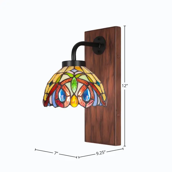 The Oxbridge Wall Sconce blends contemporary design with rustic charm through its matte black and painted wood-look metal finish. The 7-inch Lynx art glass shade provides warm, diffused lighting perfect for intimate spaces. - alternate view