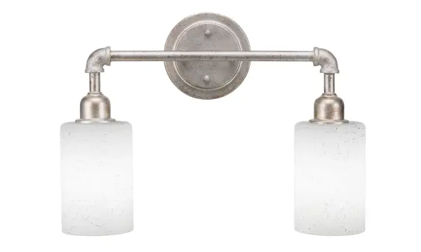 The Vintage 2 Light Bath Bar combines classic aged silver finish with soft white muslin glass for warm, diffused lighting. Its reversible mounting and traditional design make it perfect for both modern and classic bathrooms.