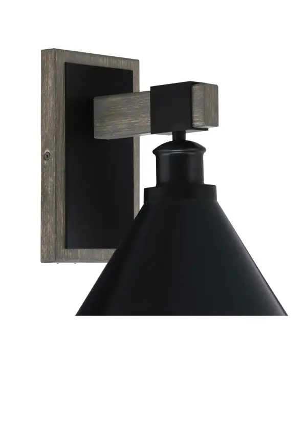 The Tacoma Wall Sconce combines matte black metal with a distressed wood-look finish for modern industrial style. Its compact 7-inch cone shade and up/down mounting flexibility make it versatile for various spaces.