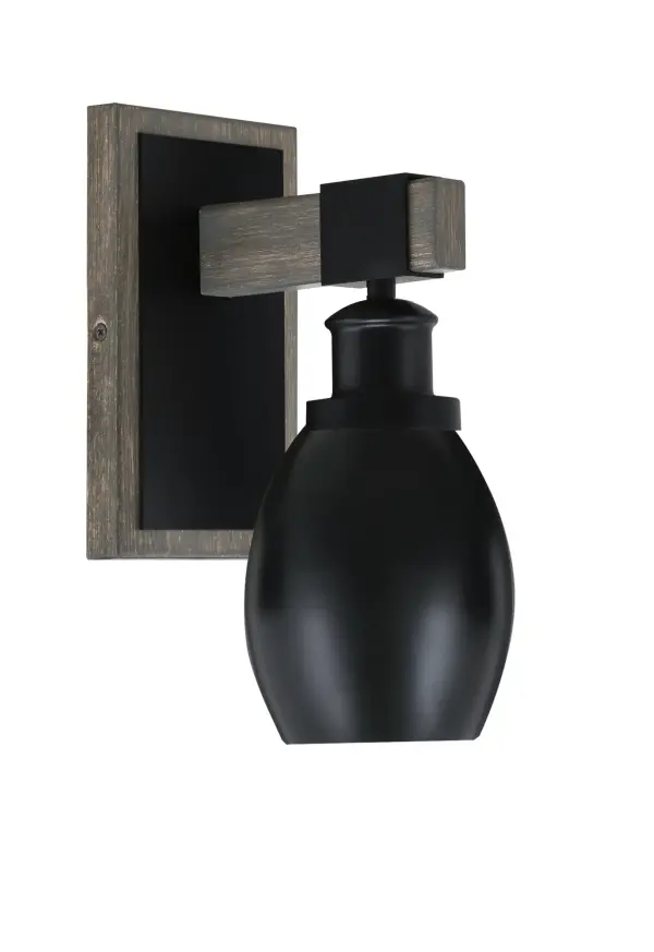 The Tacoma Wall Sconce blends modern industrial style with rustic charm through its matte black and distressed wood-look metal finish. Compact at 5" wide, it provides warm ambient lighting perfect for hallways, bedrooms, and living spaces.