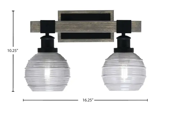 The Tacoma 2-Light Bath Bar blends industrial style with rustic farmhouse charm through its matte black finish and distressed wood-look metal accents. Smoke ribbed glass shades provide warm, diffused lighting perfect for bathroom vanities. - alternate view