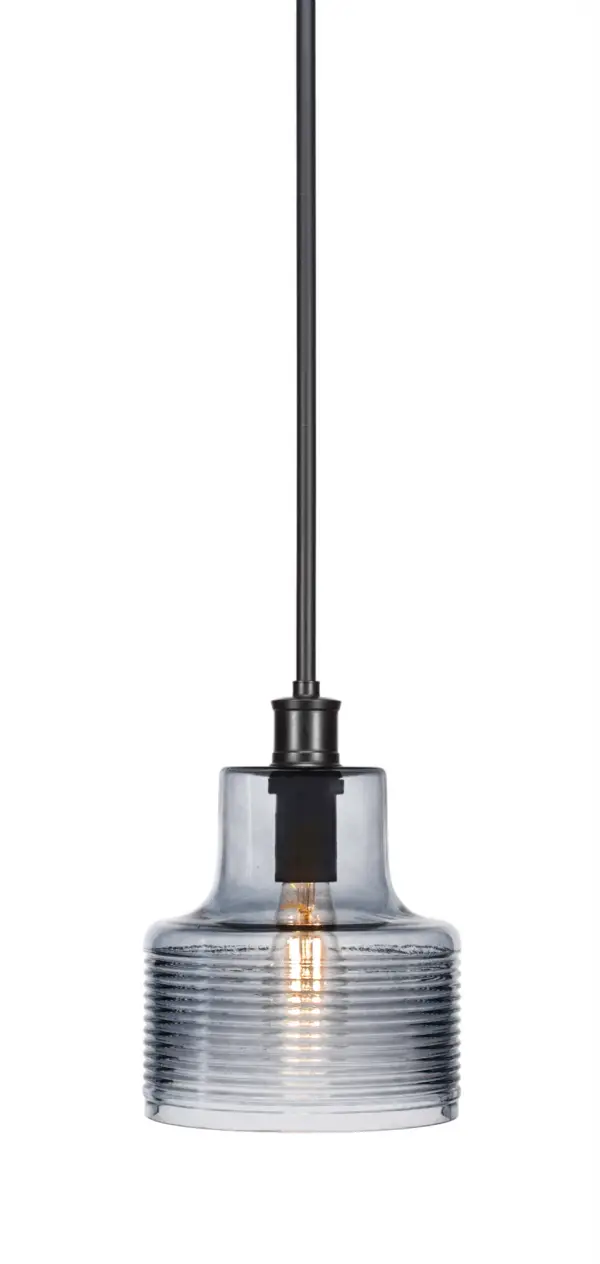 The Aurora pendant delivers a pop of color in a compact 7.5" design. Its vibrant blue glass shade paired with matte black hardware creates modern visual interest perfect for smaller spaces or grouped installations.
