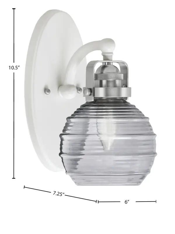 The Easton Wall Sconce combines a striking white and brushed nickel finish with a unique smoke ribbed glass shade that diffuses light beautifully. Its compact 6-inch width and versatile up/down mounting make it perfect for hallways, bedrooms, and bathrooms. - alternate view