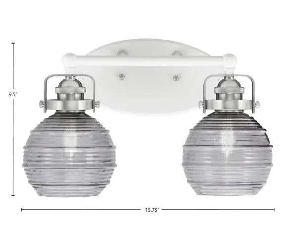 The Easton 2-Light Bath Bar combines white and brushed nickel finishes for a fresh, transitional look. Smoke ribbed glass shades diffuse light beautifully while the reversible mount allows up or down installation for design flexibility. - alternate view