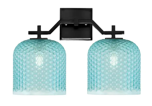 The Corbin 2 Light Bath Bar combines sleek matte black metalwork with striking turquoise textured glass shades, creating a modern statement piece that transforms ordinary bathrooms into stylish retreats with captivating light effects.