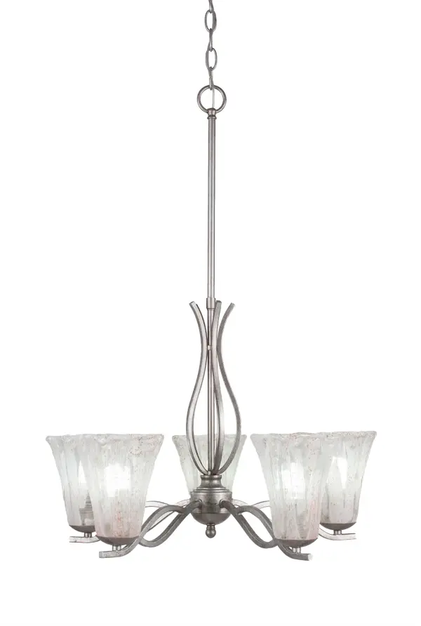 The Revo 5-Light Chandelier combines timeless elegance with versatile design. Its aged silver finish and fluted Italian ice glass create a soft, sophisticated glow perfect for dining rooms and entryways.