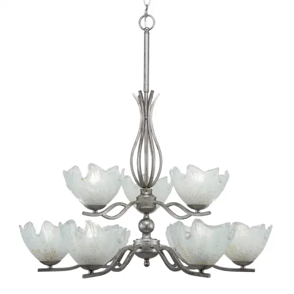 The Revo chandelier delivers dramatic uplight illumination through nine bulbs and distinctive gold ice glass shades. Its aged silver finish and substantial 29.75" width make it perfect for dining rooms and entryways seeking elegant, eye-catching lighting.