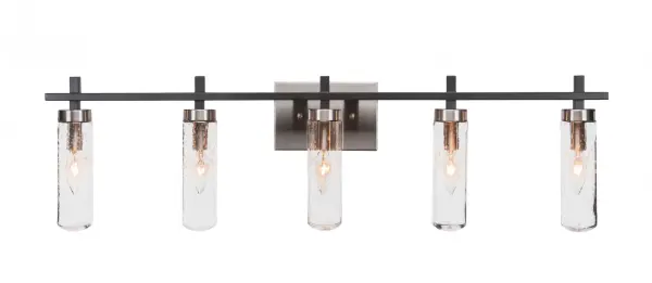 The Salinda bath bar combines contemporary style with industrial charm, featuring a striking matte black and brushed nickel two-tone finish. Five clear bubble glass shades provide excellent illumination while adding textural interest.
