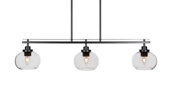 The Odyssey 3-Light Island Pendant combines contemporary styling with industrial charm. Its matte black finish and clear bubble glass shades create visual interest while providing ample illumination for kitchen islands and dining areas.