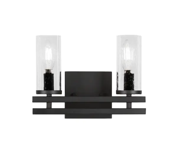 The Belmont 2-Light Bath Bar combines modern matte black styling with unique clear bubble glass shades for a distinctive look. Compact at under 11 inches wide, it's perfect for smaller bathrooms while providing ample task lighting.