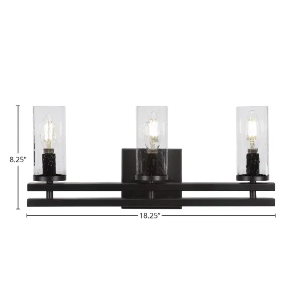 The Belmont 3 Light Bath Bar combines vintage-inspired bubble glass with a sleek matte black finish, creating a striking focal point for any bathroom. Its compact 18.25" width makes it ideal for smaller spaces while delivering ample illumination. - alternate view