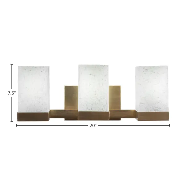 The Nouvelle 3 Light Bath Bar combines timeless brass elegance with practical functionality. Its warm New Age Brass finish and white muslin glass diffusers create soft, flattering light perfect for bathroom vanities. - alternate view