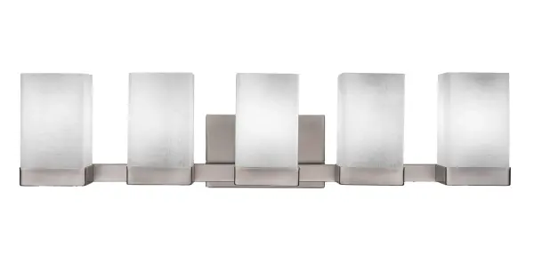 The Nouvelle 5 Light Bath Bar combines contemporary styling with practical illumination. Its graphite finish and white muslin glass shades create a warm, inviting atmosphere perfect for modern bathrooms.