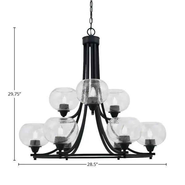 The Paramount chandelier combines contemporary matte black finish with unique clear bubble glass shades for a striking visual impact. Nine upward-facing lights create ambient illumination perfect for dining and living spaces. - alternate view