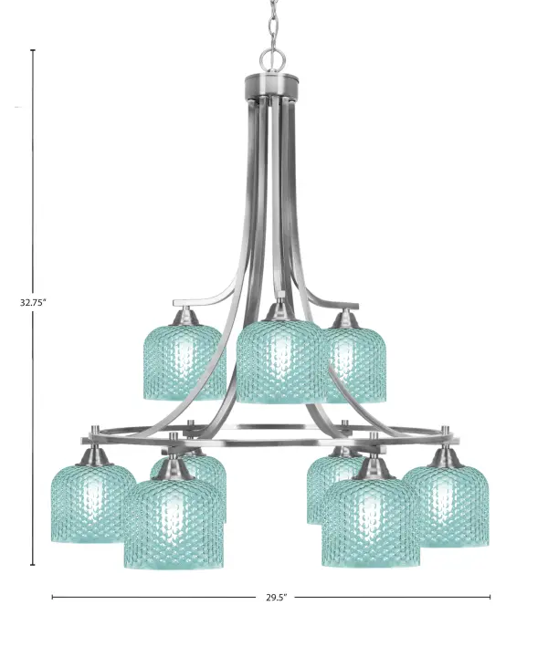 The Paramount 9-Light Chandelier combines sleek brushed nickel with striking turquoise textured glass shades, creating a sophisticated focal point. Its generous 29.5-inch width and adjustable height make it versatile for various ceiling heights. - alternate view