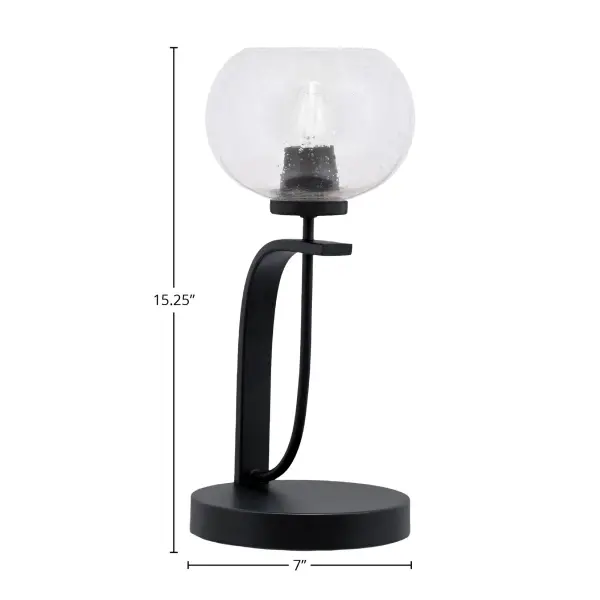 The Cavella Accent Lamp combines sleek matte black finish with a unique 7-inch clear bubble glass shade, creating a striking focal point. Perfect for adding modern sophistication to any space while providing functional task lighting. - alternate view