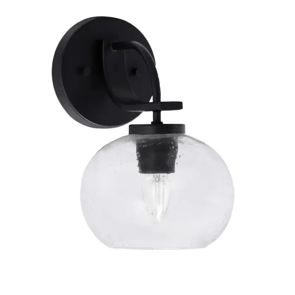 The Cavella Wall Sconce combines contemporary matte black styling with distinctive clear bubble glass for visual interest. Its compact 7-inch width and up/down mounting flexibility make it ideal for various spaces.