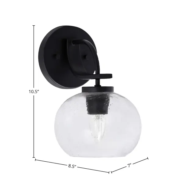 The Cavella Wall Sconce combines contemporary matte black styling with distinctive clear bubble glass for visual interest. Its compact 7-inch width and up/down mounting flexibility make it ideal for various spaces. - alternate view