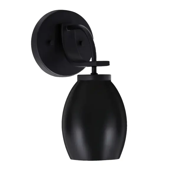 The Cavella Wall Sconce delivers modern elegance with its sleek matte black finish and distinctive oval metal shade. Compact at 5" wide, it's perfect for hallways, bathrooms, or accent lighting in any room.