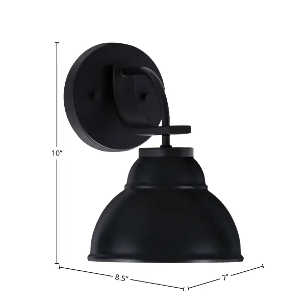 The Cavella Wall Sconce delivers striking contemporary style with its unique double bubble metal shade in matte black. Compact at 7" wide, it's perfect for smaller spaces while providing flexible up or down mounting options. - alternate view