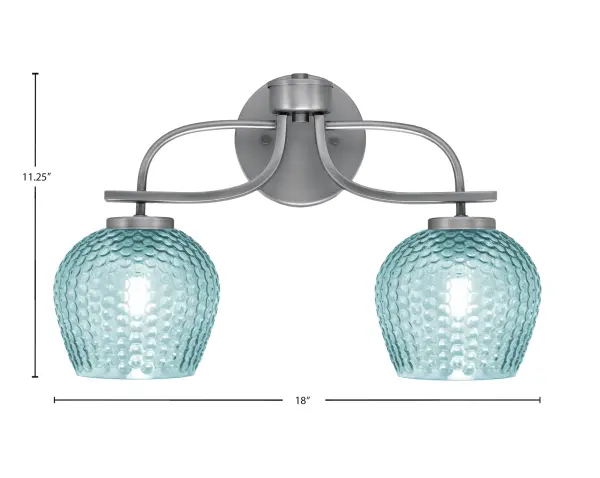 The Cavella 2-Light Bath Bar combines modern sophistication with coastal charm. Its graphite finish and vibrant turquoise textured glass shades create a stunning visual contrast while diffusing light beautifully. - alternate view