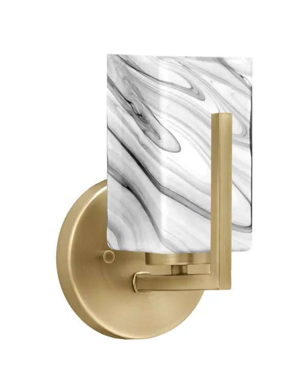 The Atlas Wall Sconce combines modern elegance with practical lighting through its New Age Brass finish and distinctive 3.5" square onyx swirl glass shade. Compact yet impactful, this versatile fixture mounts up or down for flexible installation.